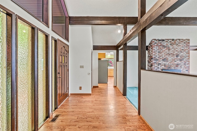 1086 W State Route 4, Skamokawa, WA 98647 - foyer with beamed ceiling and light wood-style floors