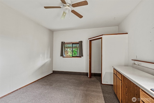 1086 W State Route 4, Skamokawa, WA 98647 - interior space featuring dark colored carpet and ceiling fan