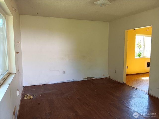 6002 S Mason Ave, Tacoma, WA 98409 - spare room with wood finished floors