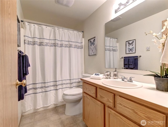 19226 12th Avenue Ct E, Spanaway, WA 98387 - bathroom with toilet, vanity, tile patterned flooring, and curtained shower