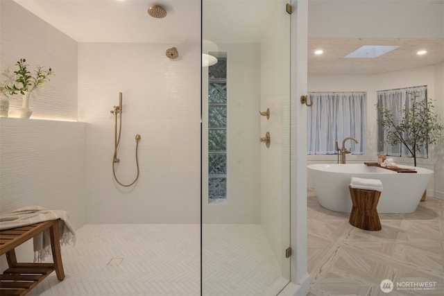 1102 12th Ave N, Edmonds, WA 98020 - bathroom with a walk in shower, a freestanding tub, recessed lighting, and a skylight