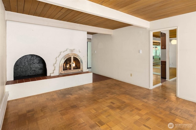 7633 NE 123rd St, Kirkland, WA 98034 - unfurnished living room featuring a lit fireplace and a wood ceiling with exposed beams