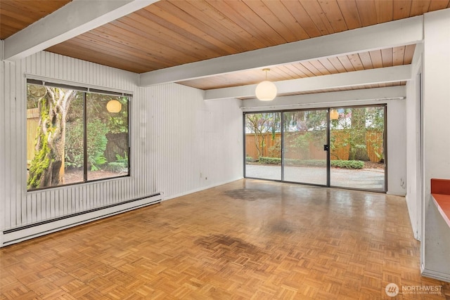 7633 NE 123rd St, Kirkland, WA 98034 - unfurnished room featuring a baseboard radiator, beam ceiling, and healthy amount of natural light