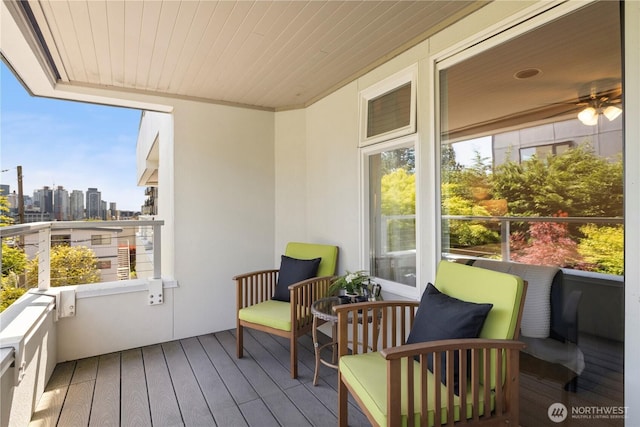 1400 Taylor Ave N Unit 203, Seattle, WA 98109 - sunroom with a ceiling fan and a city view