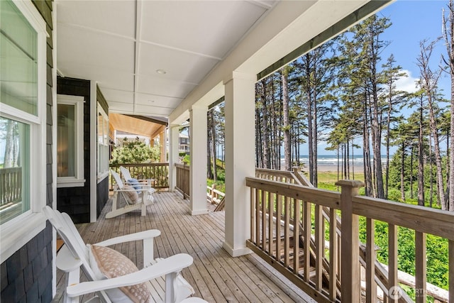 33 N Glen Ln, Pacific Beach, WA 98571 - wooden porch featuring a water view
