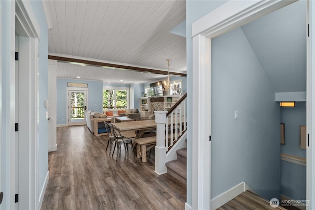 33 N Glen Ln, Pacific Beach, WA 98571 - dining area featuring a chandelier, wood finished floors, baseboards, and wooden ceiling