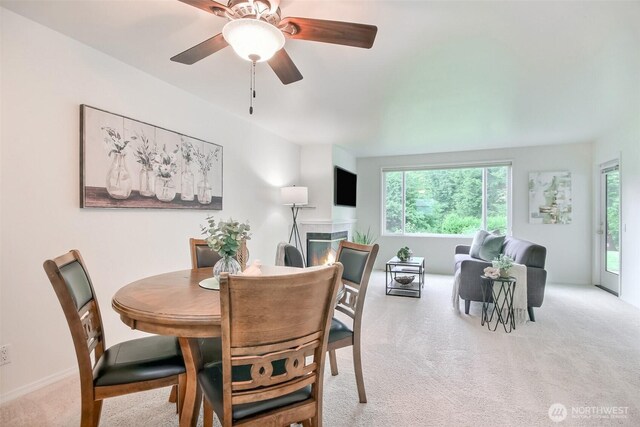 22002 SE 40th Ln Unit 1111, Issaquah, WA 98029 - dining area featuring carpet flooring and ceiling fan
