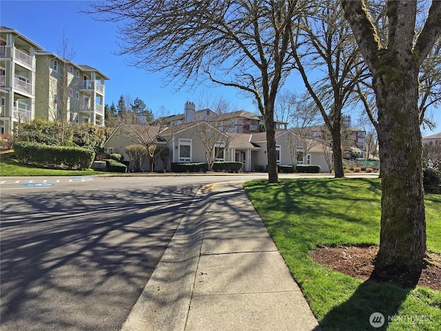 22002 SE 40th Ln Unit 1111, Issaquah, WA 98029 - view of front of property featuring a residential view and a front lawn