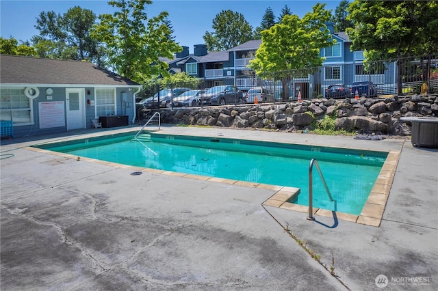 23410 18th Ave S Unit A102, Des Moines, WA 98198 - community pool featuring a patio area
