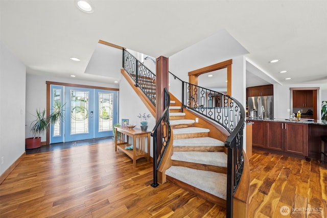 8210 Walnut Rd NE, Olympia, WA 98516 - foyer entrance featuring wood finished floors, recessed lighting, stairway, french doors, and baseboards