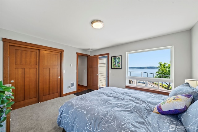 8210 Walnut Rd NE, Olympia, WA 98516 - carpeted bedroom with a water view