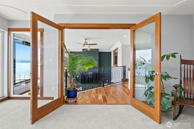 8210 Walnut Rd NE, Olympia, WA 98516 - carpeted foyer entrance featuring french doors and a ceiling fan