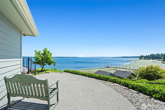 8210 Walnut Rd NE, Olympia, WA 98516 - view of patio / terrace featuring a water view
