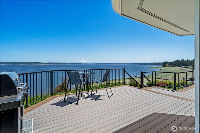 8210 Walnut Rd NE, Olympia, WA 98516 - deck with a water view and grilling area