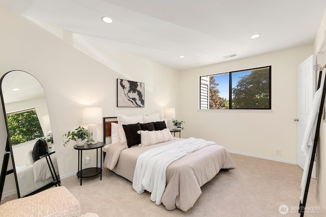 9930 NE 144th Ln Unit 206, Kirkland, WA 98034 - bedroom featuring light colored carpet, multiple windows, recessed lighting, and baseboards
