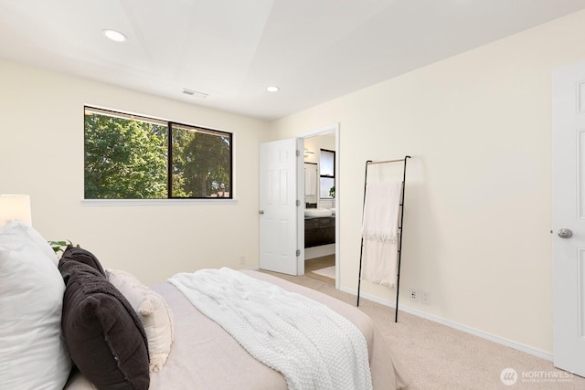 9930 NE 144th Ln Unit 206, Kirkland, WA 98034 - bedroom with light colored carpet, recessed lighting, and baseboards