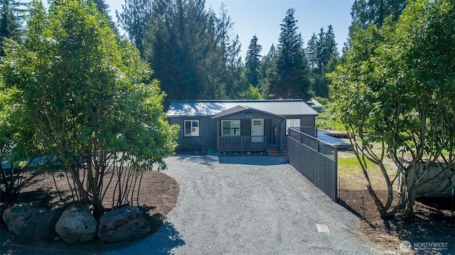 20215 Crystal Springs Dr, Granite Falls, WA 98252 - view of front of home featuring driveway and metal roof