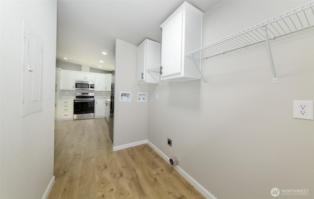20215 Crystal Springs Dr, Granite Falls, WA 98252 - laundry area featuring hookup for an electric dryer, hookup for a washing machine, light wood-type flooring, baseboards, and recessed lighting