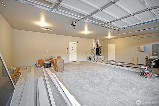 161 N Camano Ridge Rd, Camano Island, WA 98282 - garage with a garage door opener and electric panel