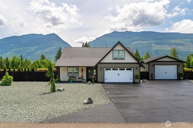 7420 Windsong Ln, Sedro Woolley, WA 98284 - view of front of home featuring driveway, a mountain view, and a garage