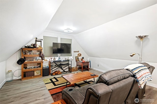 7420 Windsong Ln, Sedro Woolley, WA 98284 - living room featuring lofted ceiling, wood finished floors, and baseboards
