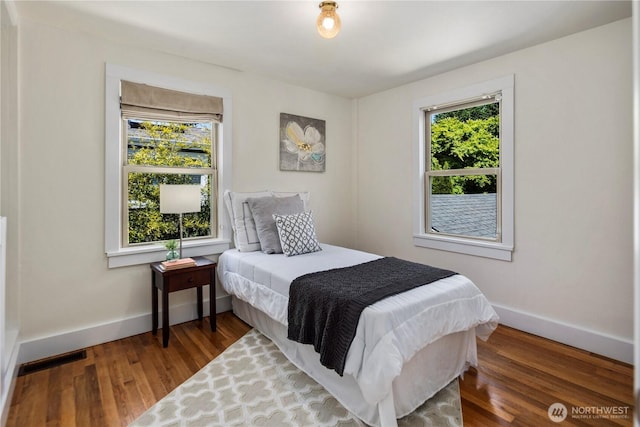 8414 9th Ave SW, Seattle, WA 98106 - bedroom featuring baseboards and wood finished floors