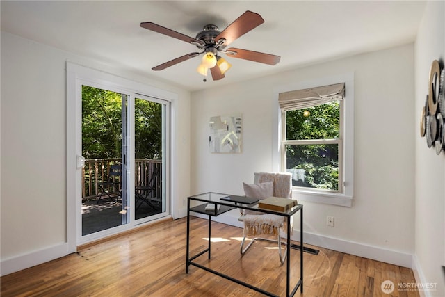 8414 9th Ave SW, Seattle, WA 98106 - office area with baseboards, wood finished floors, and ceiling fan