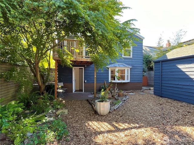 8414 9th Ave SW, Seattle, WA 98106 - rear view of house featuring a wooden deck and a patio area