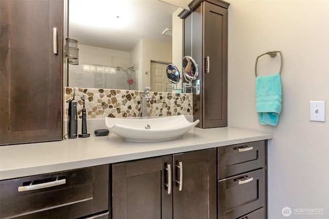 2311 Milton Way Unit F, Milton, WA 98354 - bathroom with vanity, tasteful backsplash, and a tile shower