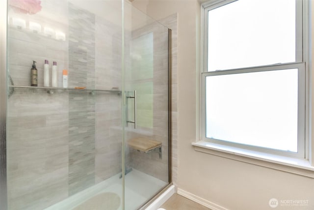 2311 Milton Way Unit F, Milton, WA 98354 - bathroom with a stall shower and baseboards
