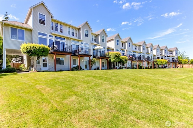 2311 Milton Way Unit F, Milton, WA 98354 - rear view of house featuring a residential view and a yard