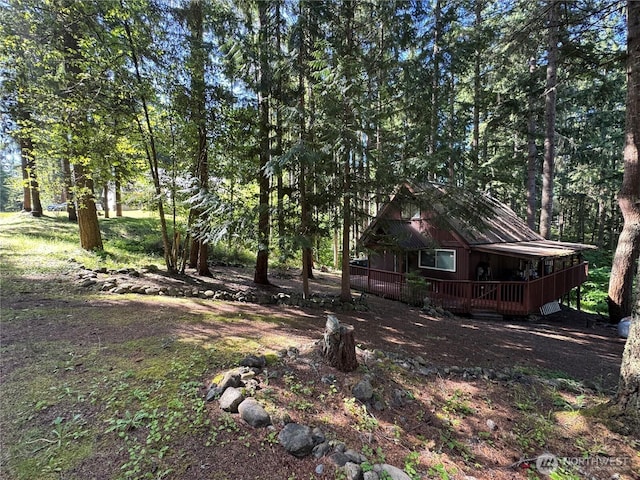 22337 Bluewater Dr SE, Yelm, WA 98597 - view of yard featuring a deck