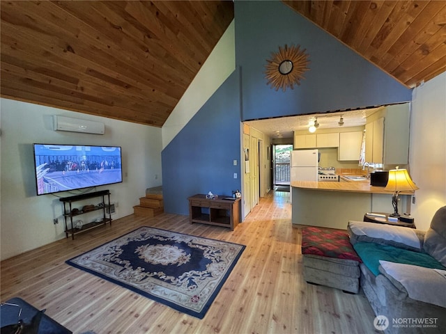 22337 Bluewater Dr SE, Yelm, WA 98597 - living room with wooden ceiling, light wood-type flooring, high vaulted ceiling, and a wall mounted air conditioner