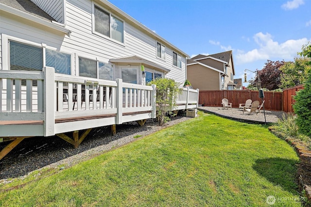 30101 129th Pl SE, Auburn, WA 98092 - view of yard featuring a wooden deck, a patio area, and an outdoor fire pit