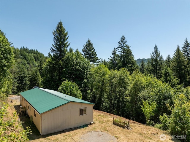 5530 Lewis River Rd, Ariel, WA 98603 - view of outbuilding featuring a view of trees