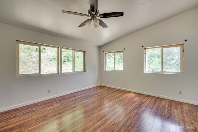 5530 Lewis River Rd, Ariel, WA 98603 - empty room featuring wood finished floors, lofted ceiling, ceiling fan, and baseboards