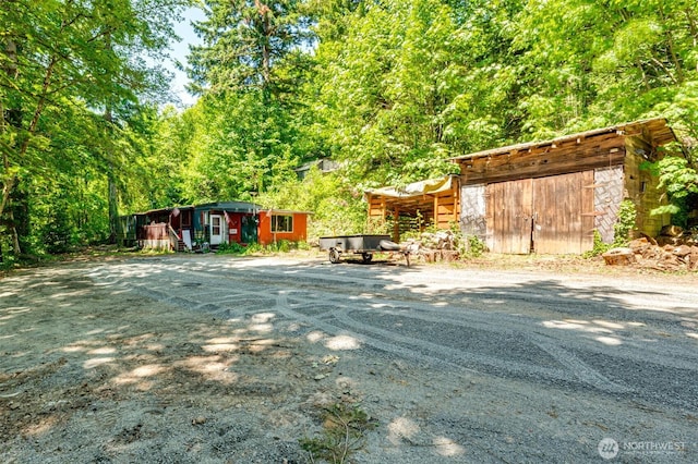 5530 Lewis River Rd, Ariel, WA 98603 - view of yard featuring an outdoor structure