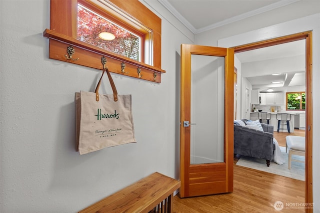 4528 36th Ave NE, Seattle, WA 98105 - mudroom featuring wood finished floors and ornamental molding