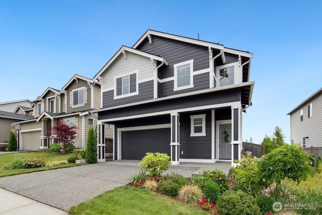 1134 Baker Heights Loop, Bremerton, WA 98312 - view of front facade with an attached garage, concrete driveway, and a porch