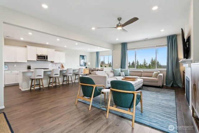 1134 Baker Heights Loop, Bremerton, WA 98312 - living area featuring ceiling fan, dark wood-style floors, recessed lighting, and a fireplace