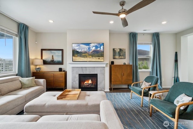 1134 Baker Heights Loop, Bremerton, WA 98312 - living room with recessed lighting, a fireplace, a ceiling fan, and wood finished floors