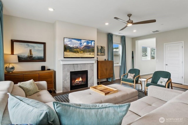 1134 Baker Heights Loop, Bremerton, WA 98312 - living area featuring baseboards, a ceiling fan, a tile fireplace, recessed lighting, and wood finished floors