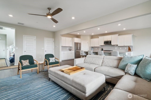 1134 Baker Heights Loop, Bremerton, WA 98312 - living area featuring recessed lighting, ceiling fan, and dark wood-style floors