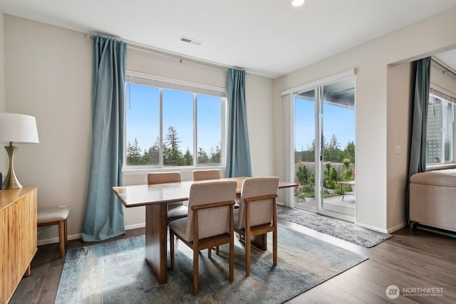 1134 Baker Heights Loop, Bremerton, WA 98312 - dining area featuring healthy amount of natural light, wood finished floors, and recessed lighting