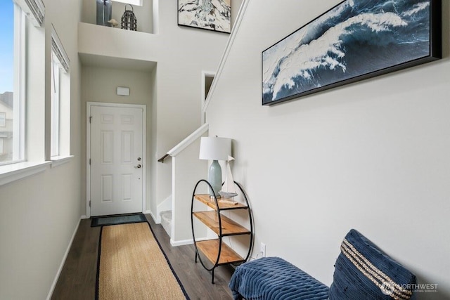 1134 Baker Heights Loop, Bremerton, WA 98312 - foyer entrance featuring dark wood-style flooring, stairway, and baseboards