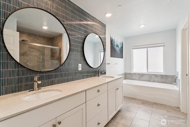 1134 Baker Heights Loop, Bremerton, WA 98312 - full bathroom with a bath, double vanity, backsplash, a shower with door, and tile walls