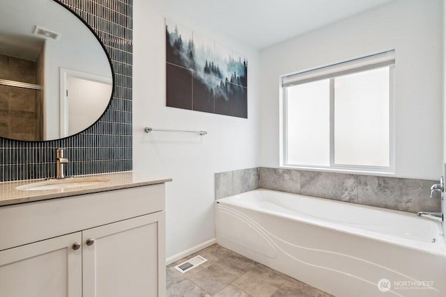 1134 Baker Heights Loop, Bremerton, WA 98312 - bathroom with vanity, a garden tub, and baseboards