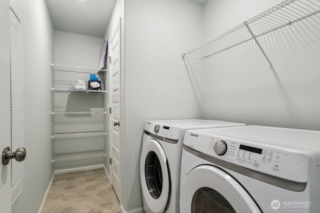 1134 Baker Heights Loop, Bremerton, WA 98312 - washroom with washer and dryer and baseboards