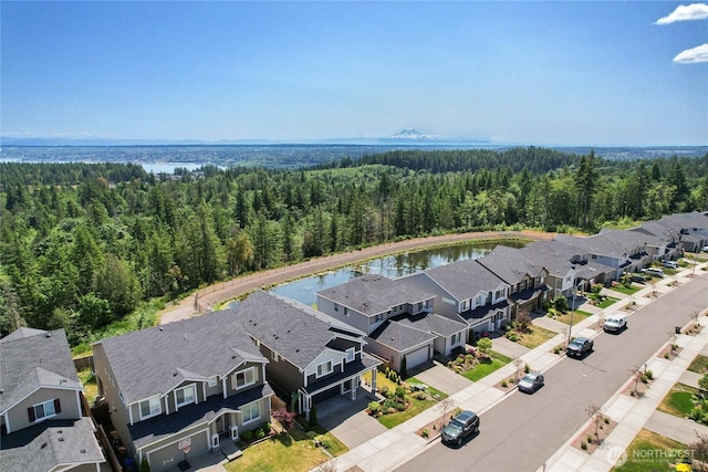 1134 Baker Heights Loop, Bremerton, WA 98312 - aerial view of residential area featuring a heavily wooded area and a large body of water