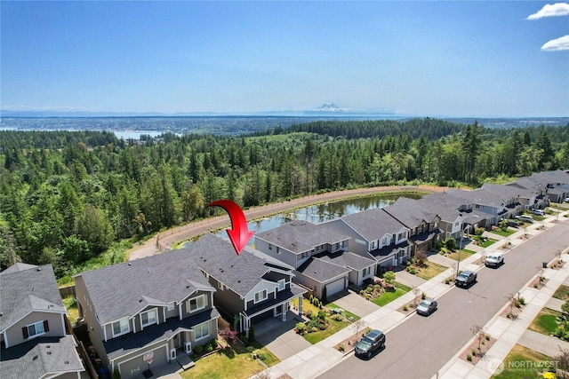 1134 Baker Heights Loop, Bremerton, WA 98312 - aerial view of residential area featuring a heavily wooded area and a nearby body of water